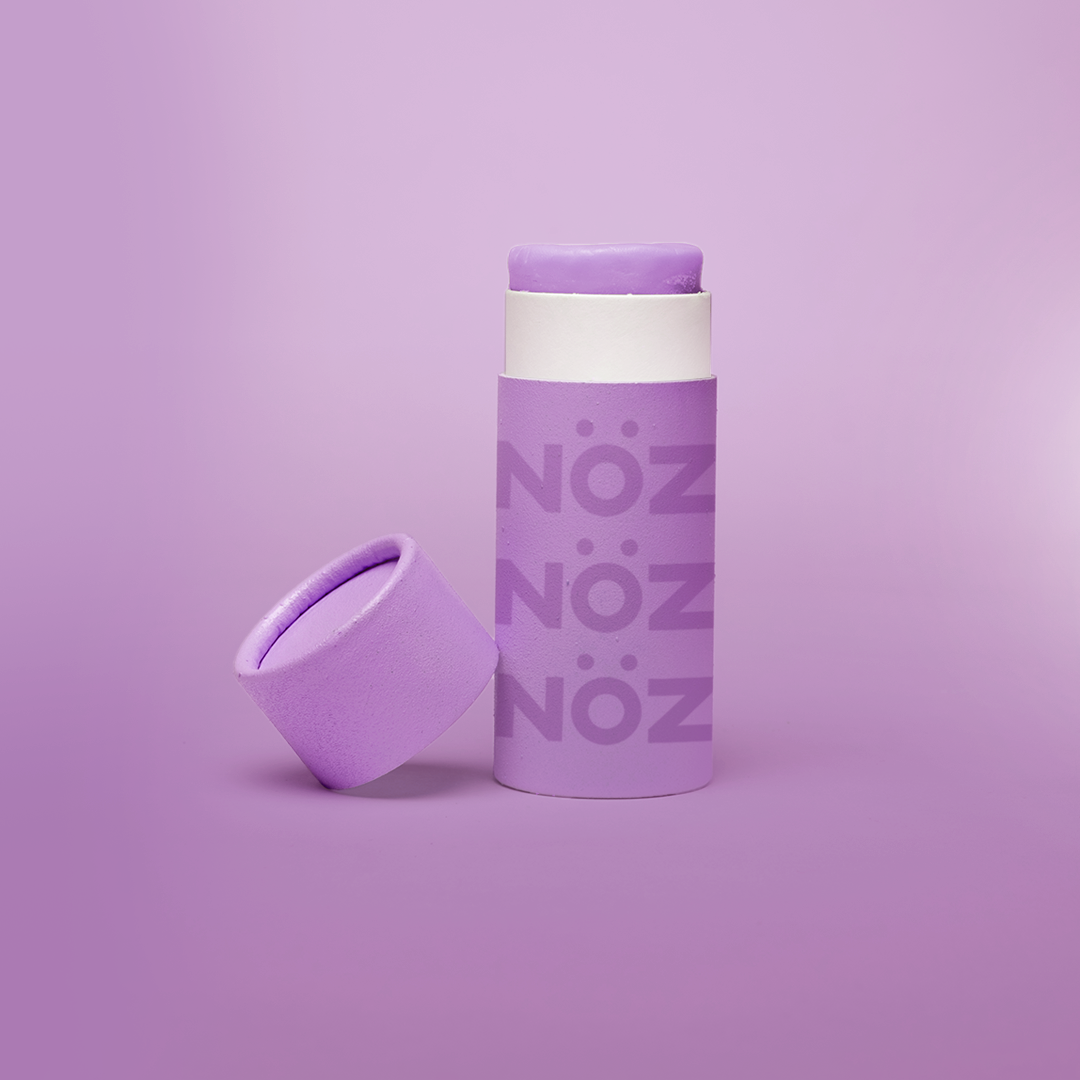 Purple Nözscreen posed in center with light purple background.